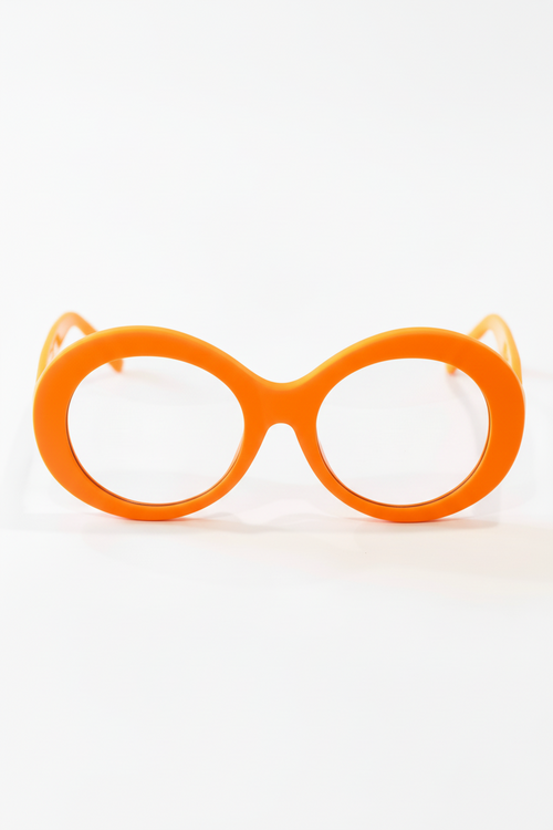 Orange eyeglasses on a white background