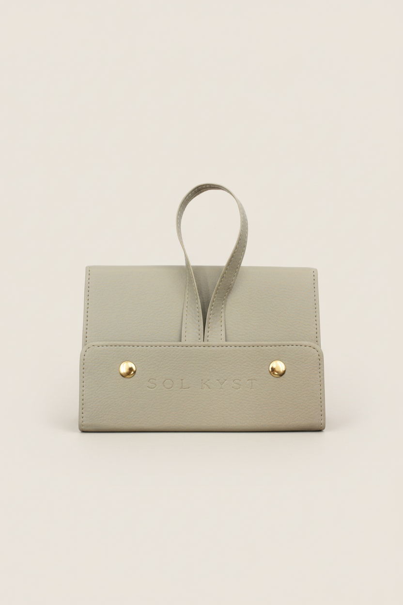 travel case for sunglasses or glasses, snap closure, strap for hanging or holding, beige leather, gold snaps