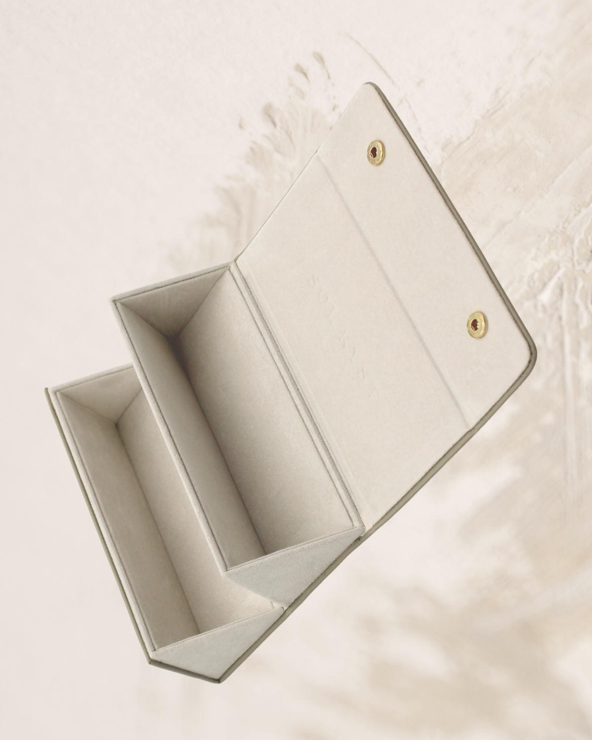 travel case for sunglasses or glasses, snap closure, strap for hanging or holding, beige leather, gold snaps - shown open, gold snaps along top right, two slots for glasses